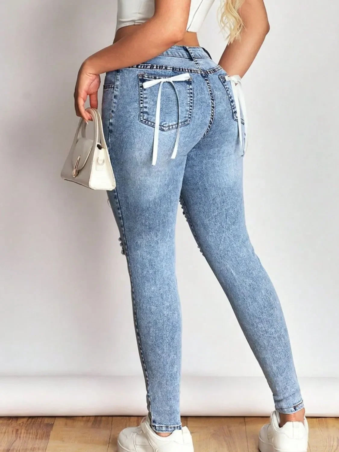 Coastal Distressed Stretch Skinny Jeans With Bow Back Design - Southern Shores Clothing