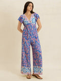 Printed V-Neck Flutter Sleeve Wide Leg Jumpsuit Elastic Waist - Southern Shores Clothing