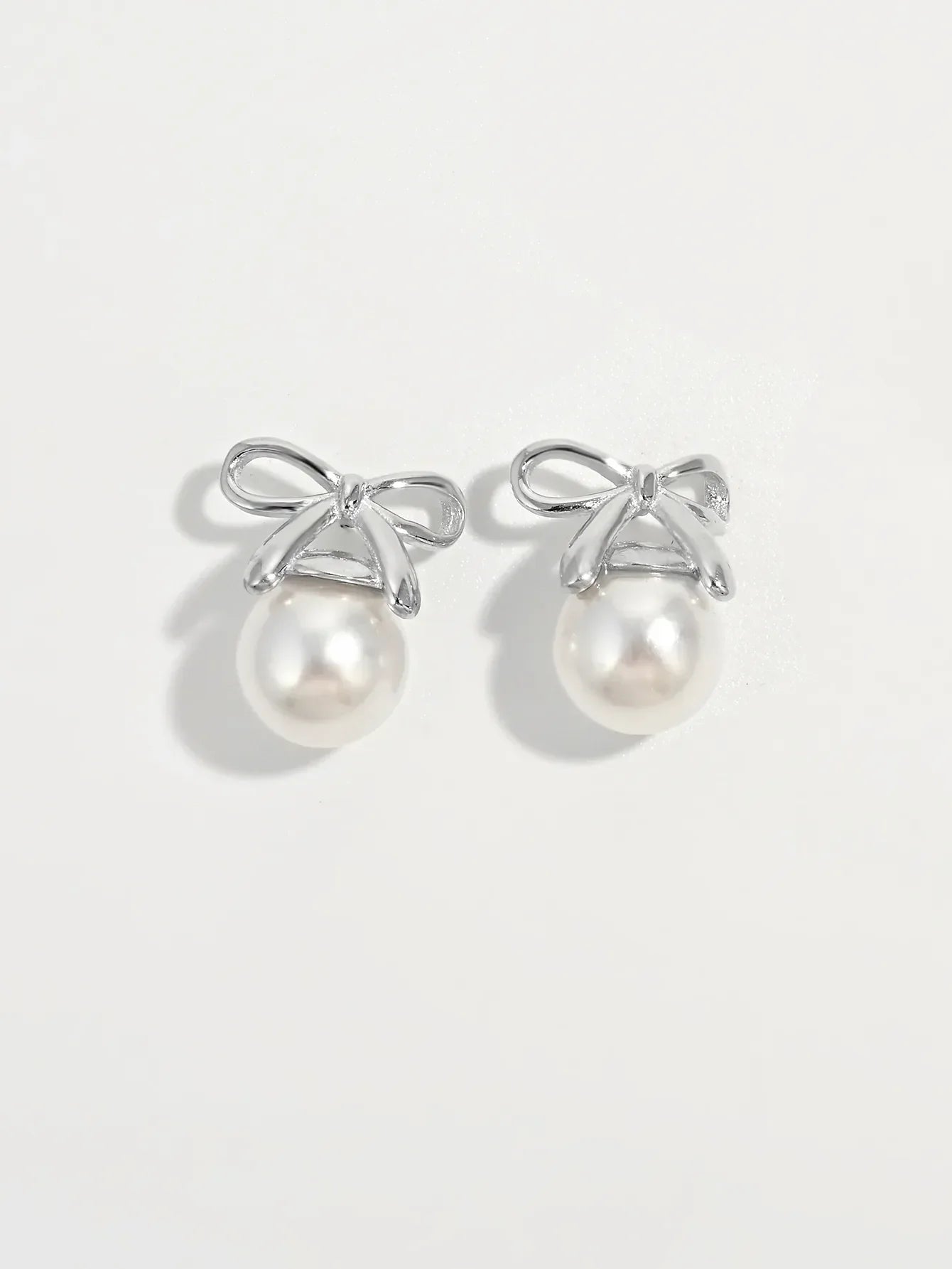 Platinum Plated Sterling Silver Pearl Bow Earrings - Southern Shores Clothing