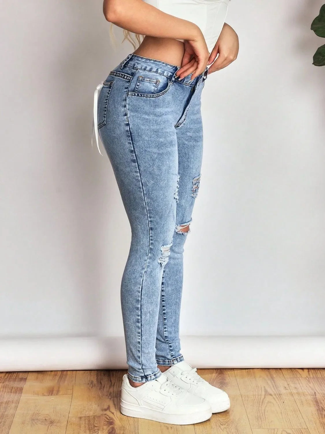 Coastal Distressed Stretch Skinny Jeans With Bow Back Design - Southern Shores Clothing