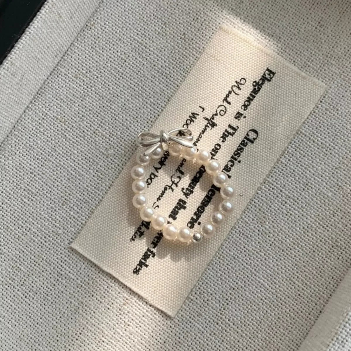 Bow Pearl Beaded Ring With Silver Bow Band