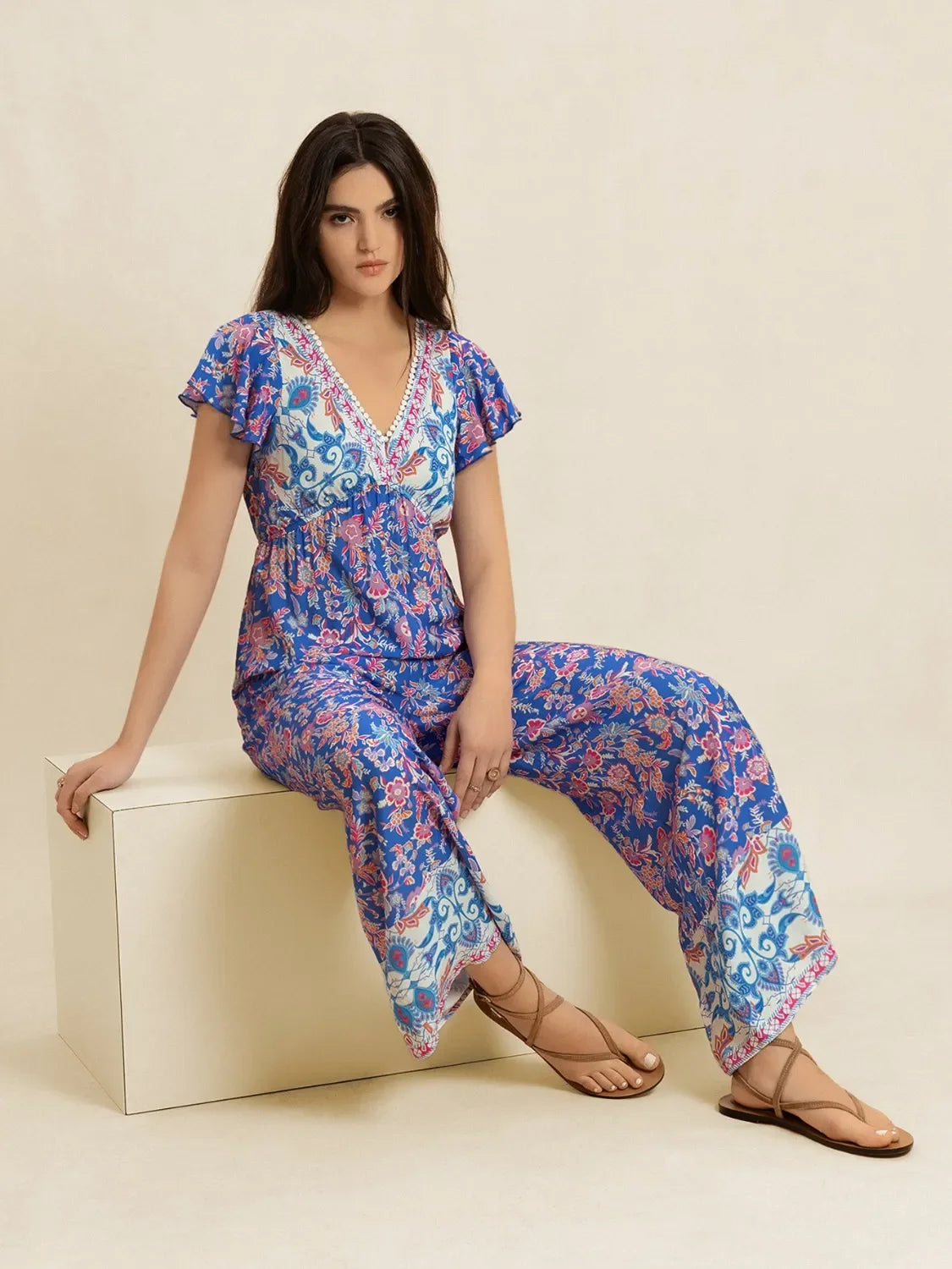 Printed V-Neck Flutter Sleeve Wide Leg Jumpsuit Elastic Waist - Southern Shores Clothing