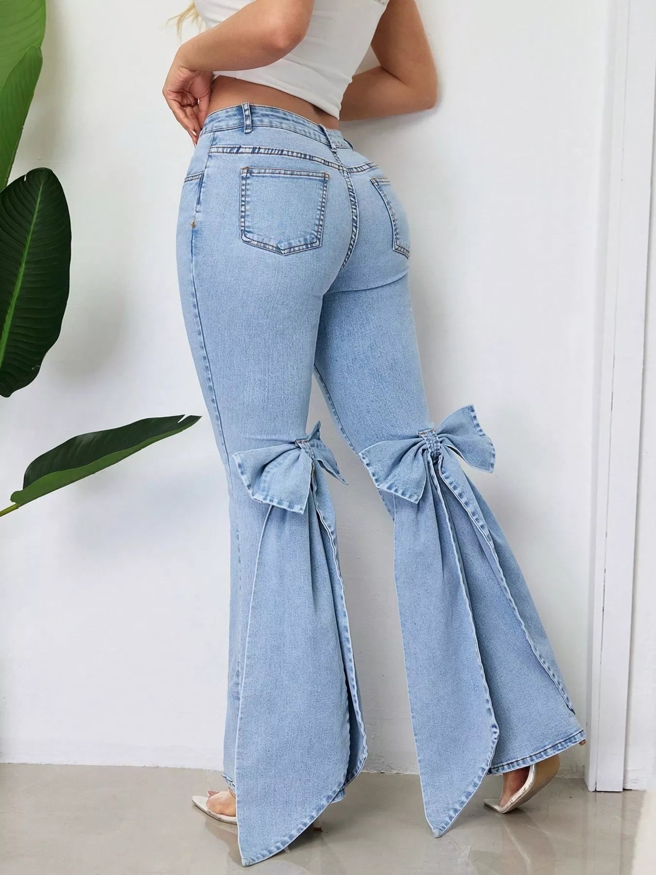 Stylish Coastal Women's Bow-Accented Flare Leg Jeans