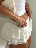 Ruched Layered Mini Skirt With Draped Design - Southern Shores Clothing