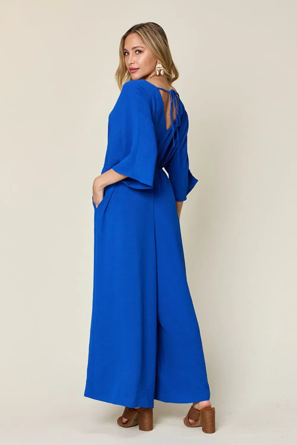 Surplice Wide-Leg Jumpsuit With Hidden Pockets - Southern Shores Clothing