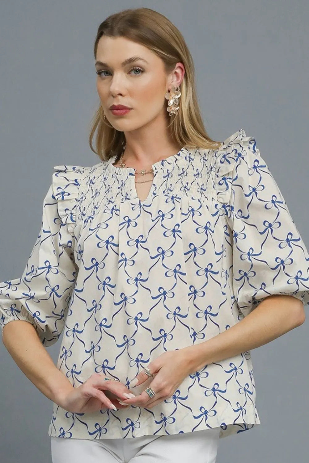 Umgee Ruffled Bow Print Notched Blouse